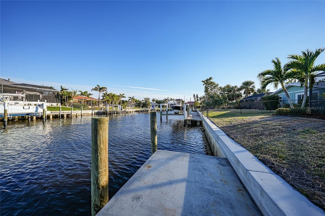 view of dock with a water view