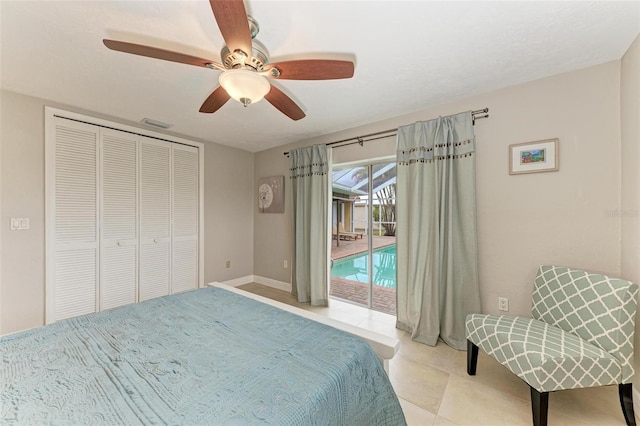 bedroom featuring light tile patterned flooring, access to outside, ceiling fan, and a closet