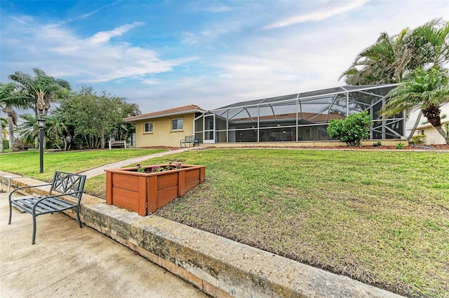 view of yard with a lanai