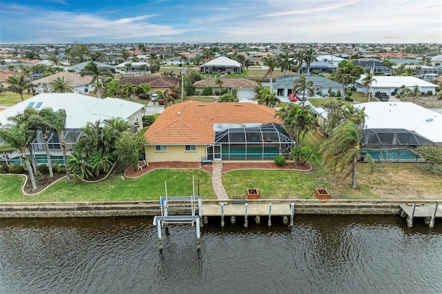 drone / aerial view with a water view