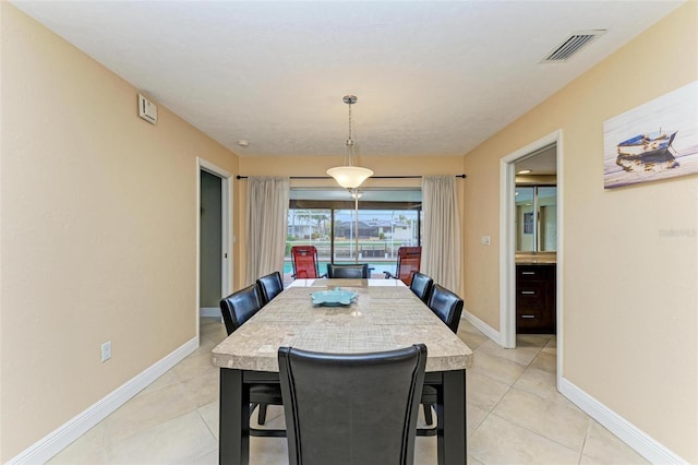 view of tiled dining space