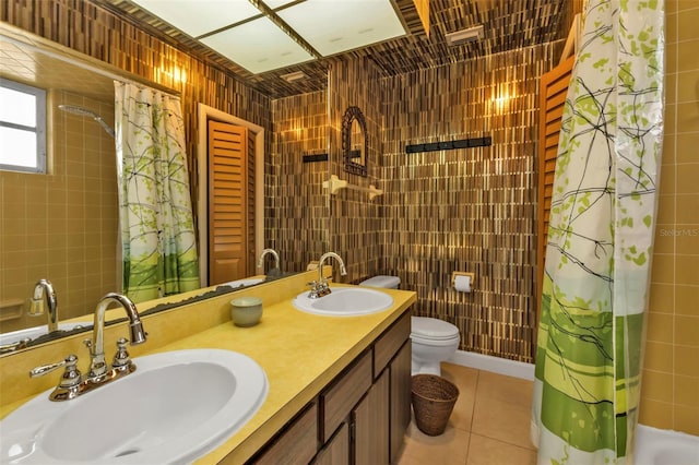 bathroom with toilet, tile patterned flooring, walk in shower, and vanity