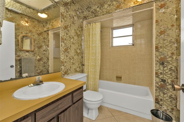 full bathroom with tile patterned floors, vanity, toilet, and shower / bath combination with curtain