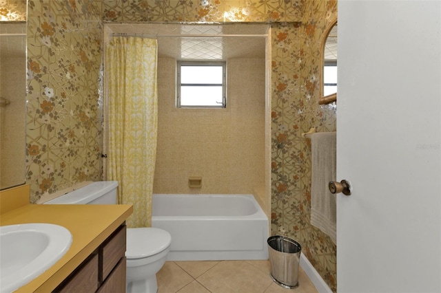 full bathroom with tile patterned floors, vanity, toilet, and shower / tub combo with curtain