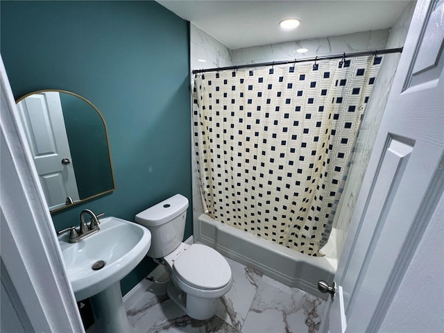 full bathroom with sink, shower / bathtub combination with curtain, and toilet