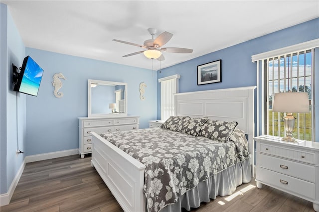 bedroom featuring ceiling fan and dark hardwood / wood-style flooring