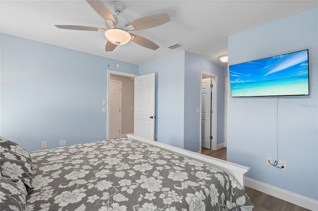 bedroom featuring ceiling fan and hardwood / wood-style floors