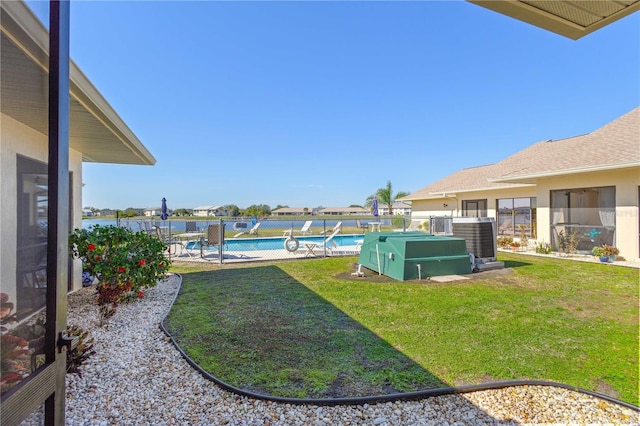 view of yard with a fenced in pool