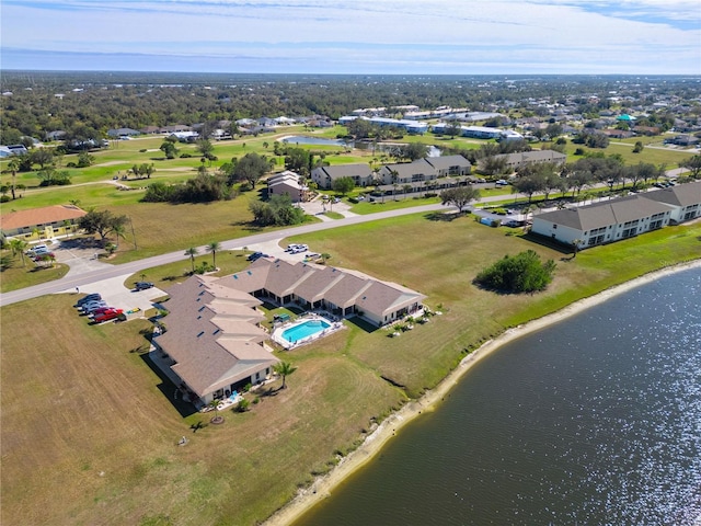 drone / aerial view with a water view