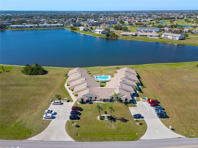 drone / aerial view with a water view