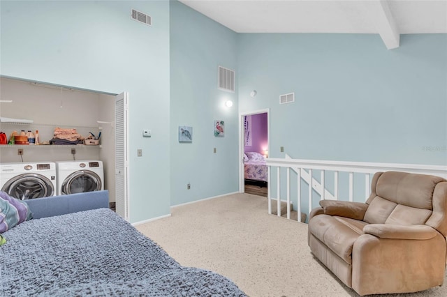 bedroom with high vaulted ceiling, washing machine and dryer, and beamed ceiling