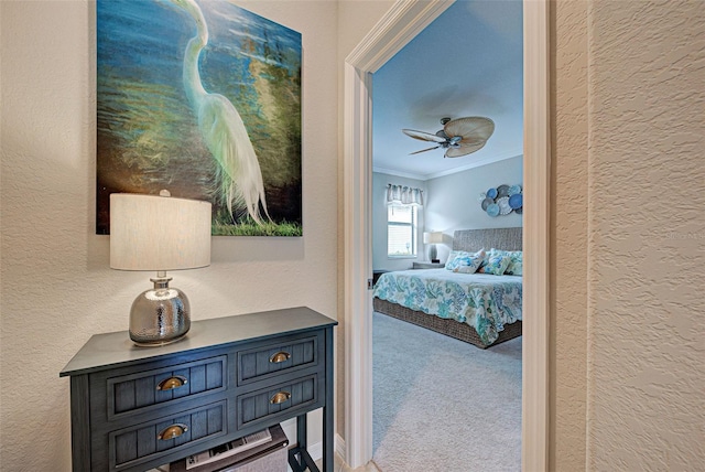 carpeted bedroom featuring ornamental molding