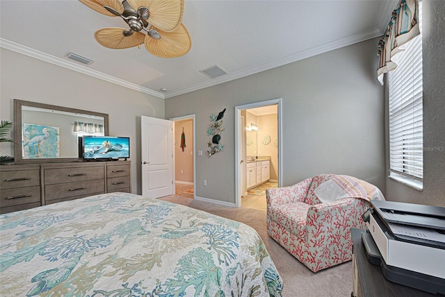 carpeted bedroom featuring ornamental molding, ensuite bathroom, and ceiling fan