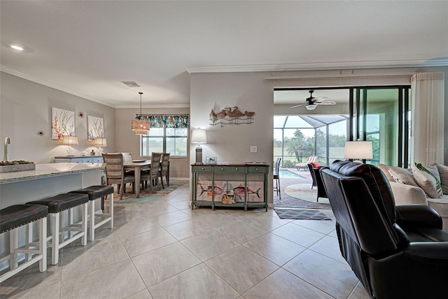 tiled living room featuring crown molding