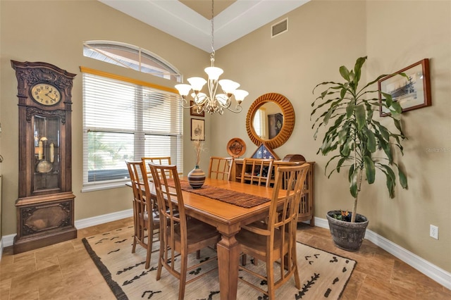 dining space featuring a chandelier