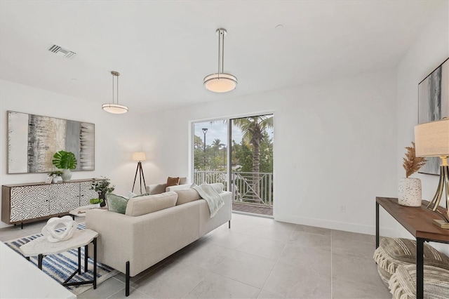 living room featuring light tile patterned floors