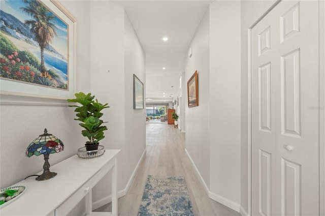 hallway featuring light hardwood / wood-style flooring