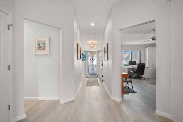 hallway featuring light hardwood / wood-style flooring