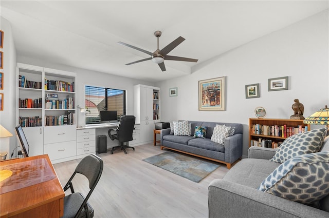 home office featuring ceiling fan and light hardwood / wood-style flooring