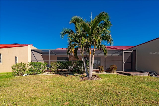 view of yard featuring a lanai