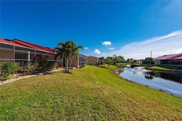 view of yard featuring a water view