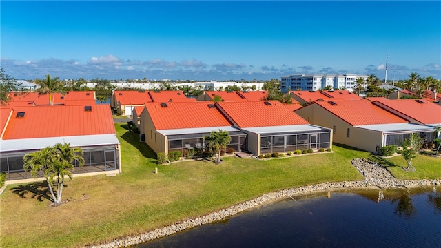 drone / aerial view with a water view