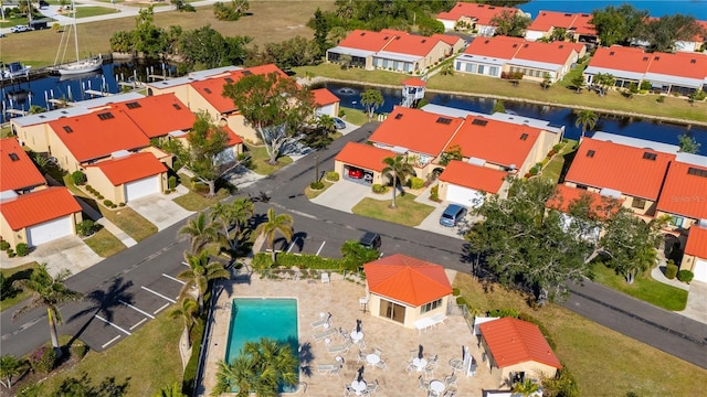 drone / aerial view with a water view