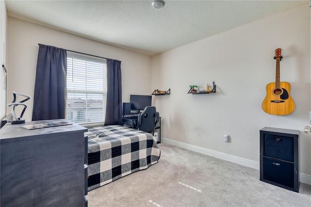 carpeted bedroom with a textured ceiling