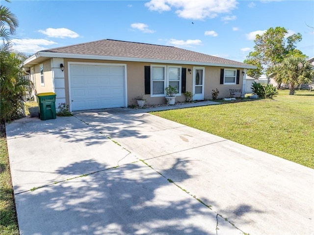 single story home with a front yard and a garage