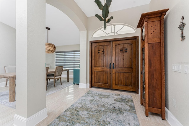 entryway with light hardwood / wood-style flooring