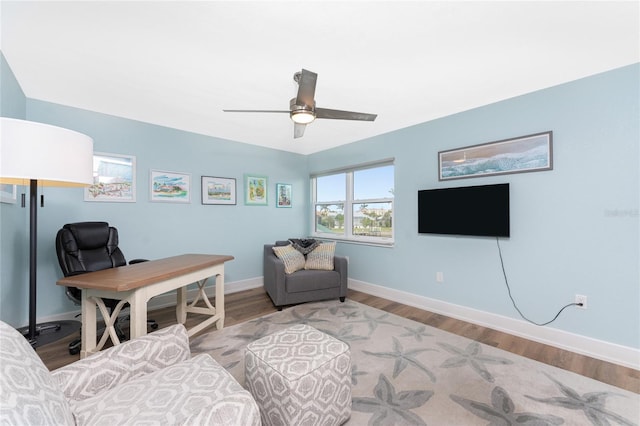 interior space with ceiling fan and light wood-type flooring