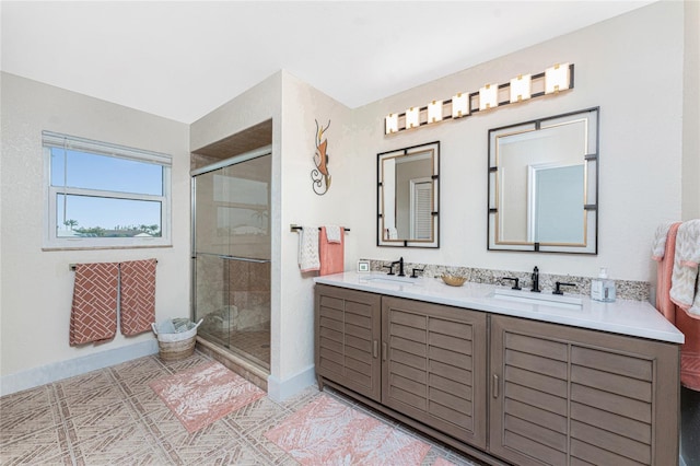 bathroom with vanity and an enclosed shower