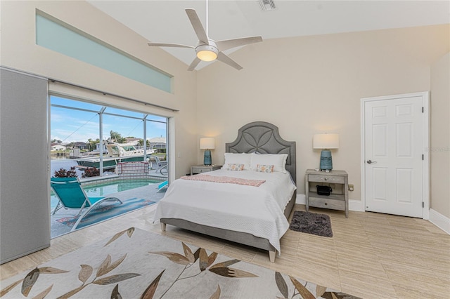 bedroom featuring ceiling fan, access to exterior, and high vaulted ceiling