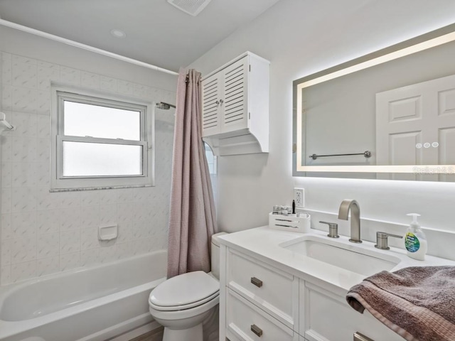 full bathroom with vanity, toilet, and shower / bath combo with shower curtain