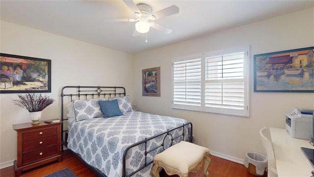 bedroom featuring dark hardwood / wood-style floors and ceiling fan