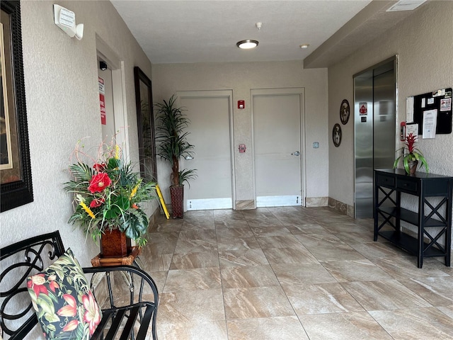 foyer featuring elevator