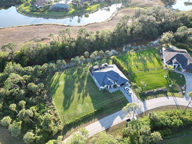 drone / aerial view with a water view