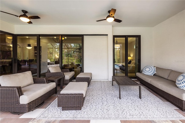 view of patio / terrace featuring ceiling fan and an outdoor hangout area