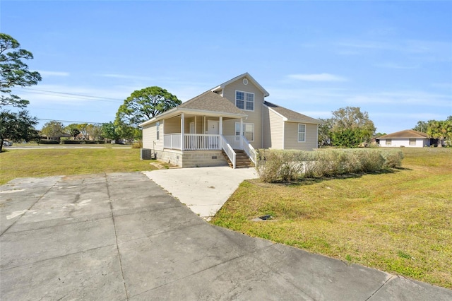 view of front of home with a porch and a front yard