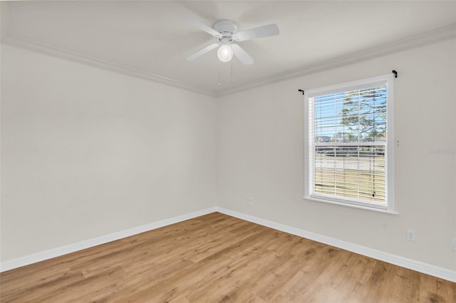 unfurnished room featuring ceiling fan, ornamental molding, and light hardwood / wood-style floors