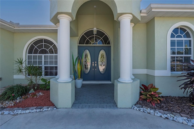 doorway to property with a porch