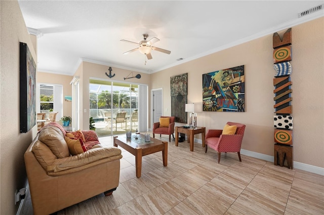 living room with ceiling fan and crown molding