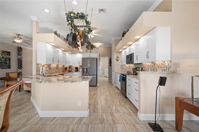 kitchen with black appliances, white cabinetry, kitchen peninsula, and sink