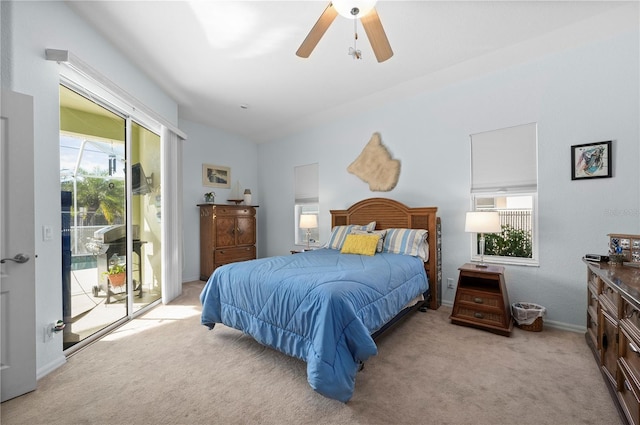 carpeted bedroom with access to exterior and ceiling fan