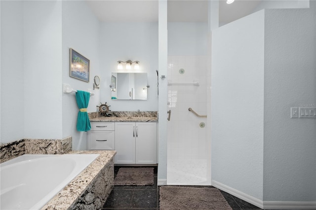 bathroom with independent shower and bath and vanity