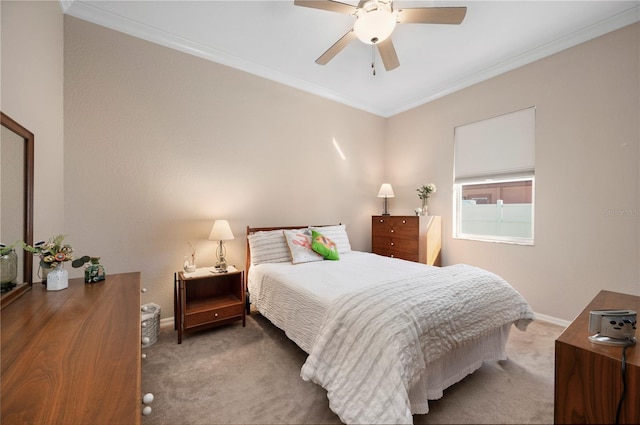 bedroom featuring carpet floors, ceiling fan, and ornamental molding