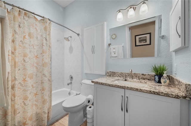 full bathroom with vanity, toilet, and shower / bath combination with curtain