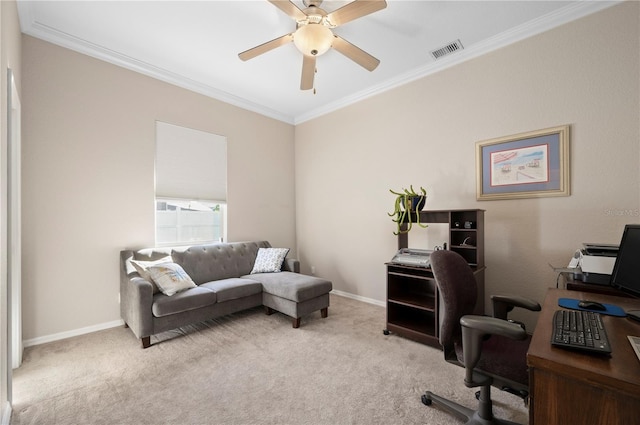 carpeted office space featuring crown molding and ceiling fan