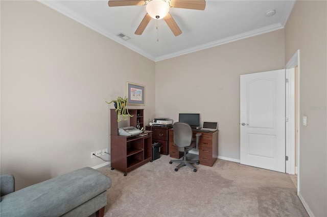 carpeted home office with ceiling fan and crown molding