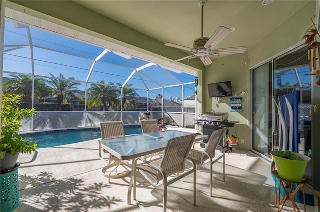 view of patio featuring ceiling fan, a lanai, and a grill